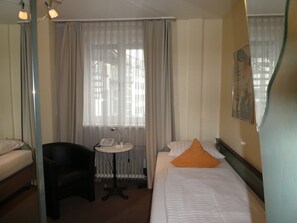 Premium bedding, down comforters, pillowtop beds, minibar