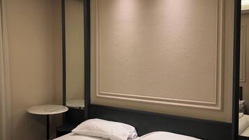 Premium bedding, down duvets, pillow-top beds, minibar