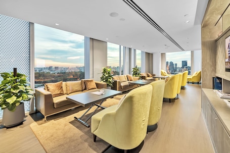 In-room safe, desk, blackout drapes, iron/ironing board. JEN Singapore Orchardgateway by Shangri-La