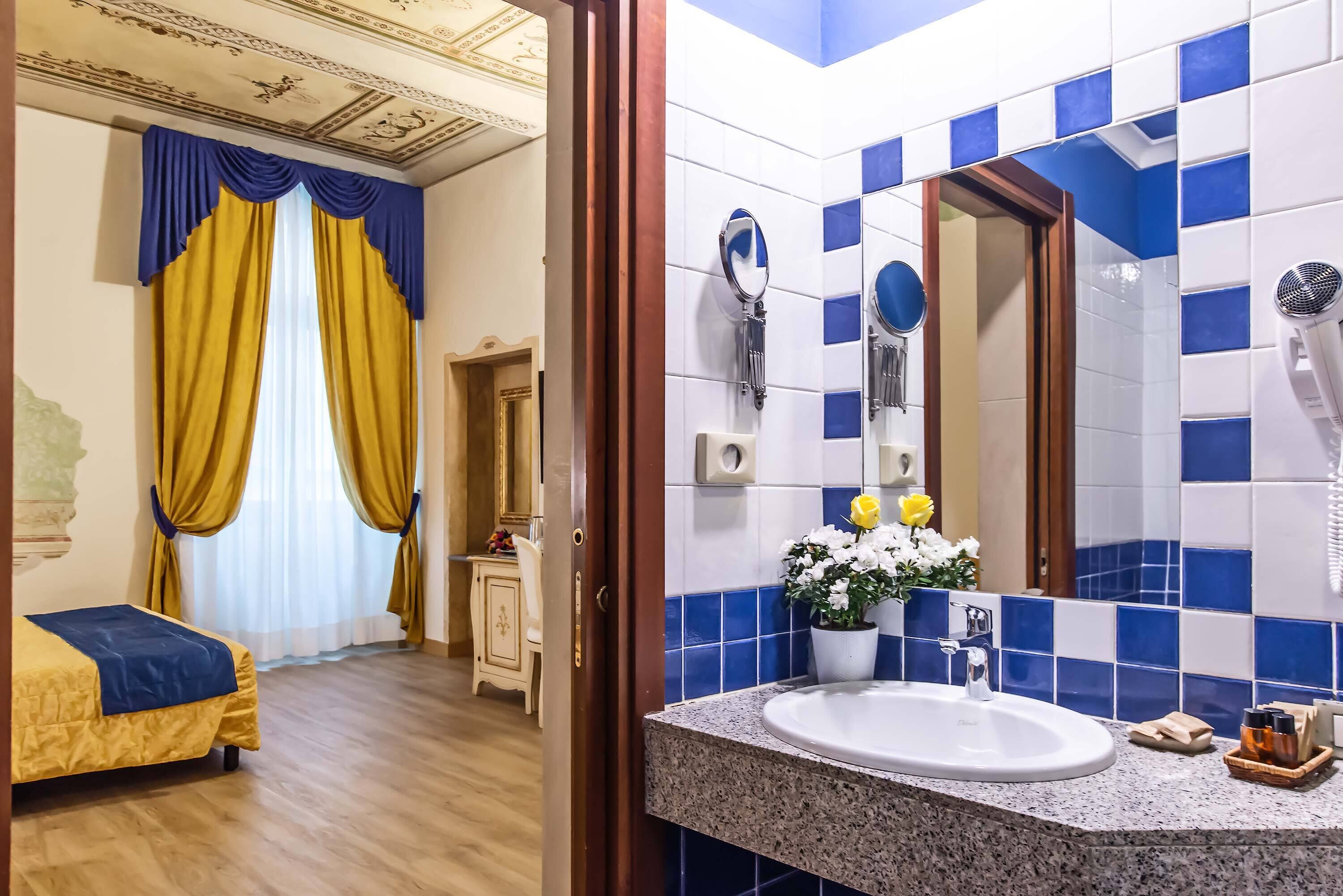 standard triple room | bathroom | free toiletries, hair dryer, towels