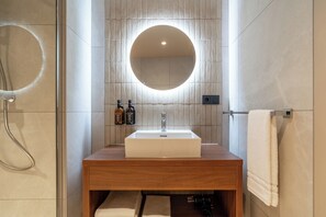 Suite | Bathroom | Designer toiletries, hair dryer, towels