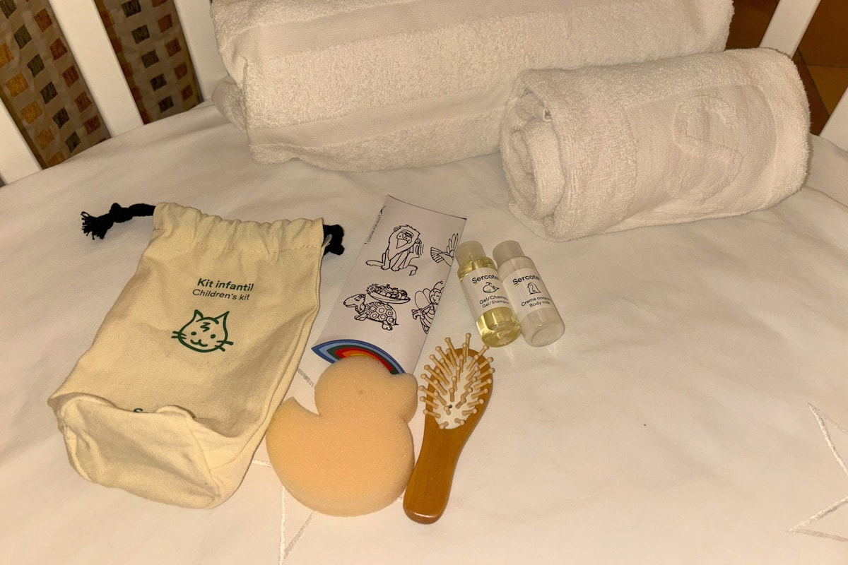 classic twin room | minibar, in-room safe, desk, blackout curtains