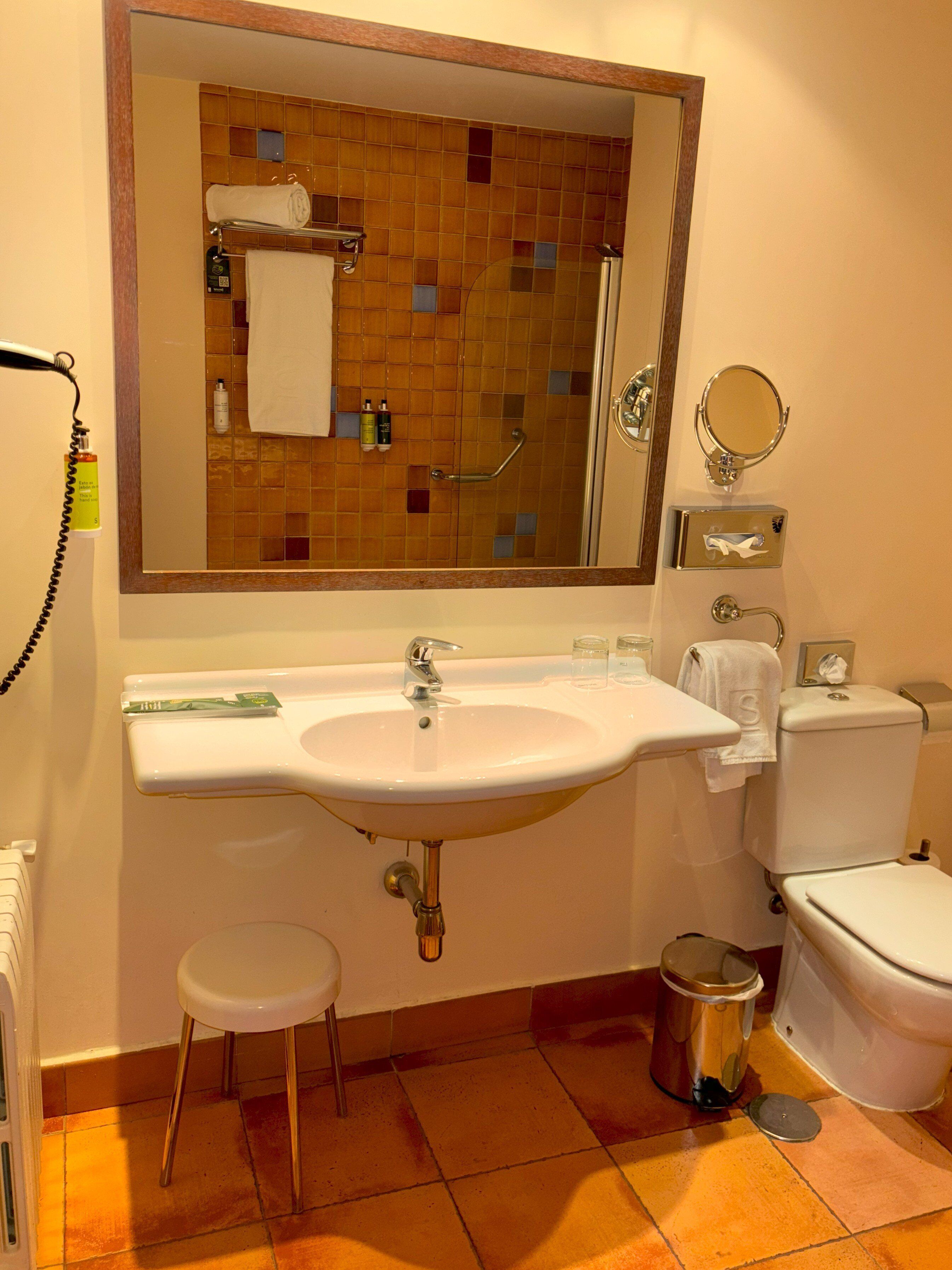 bathtub, free toiletries, hair dryer, towels