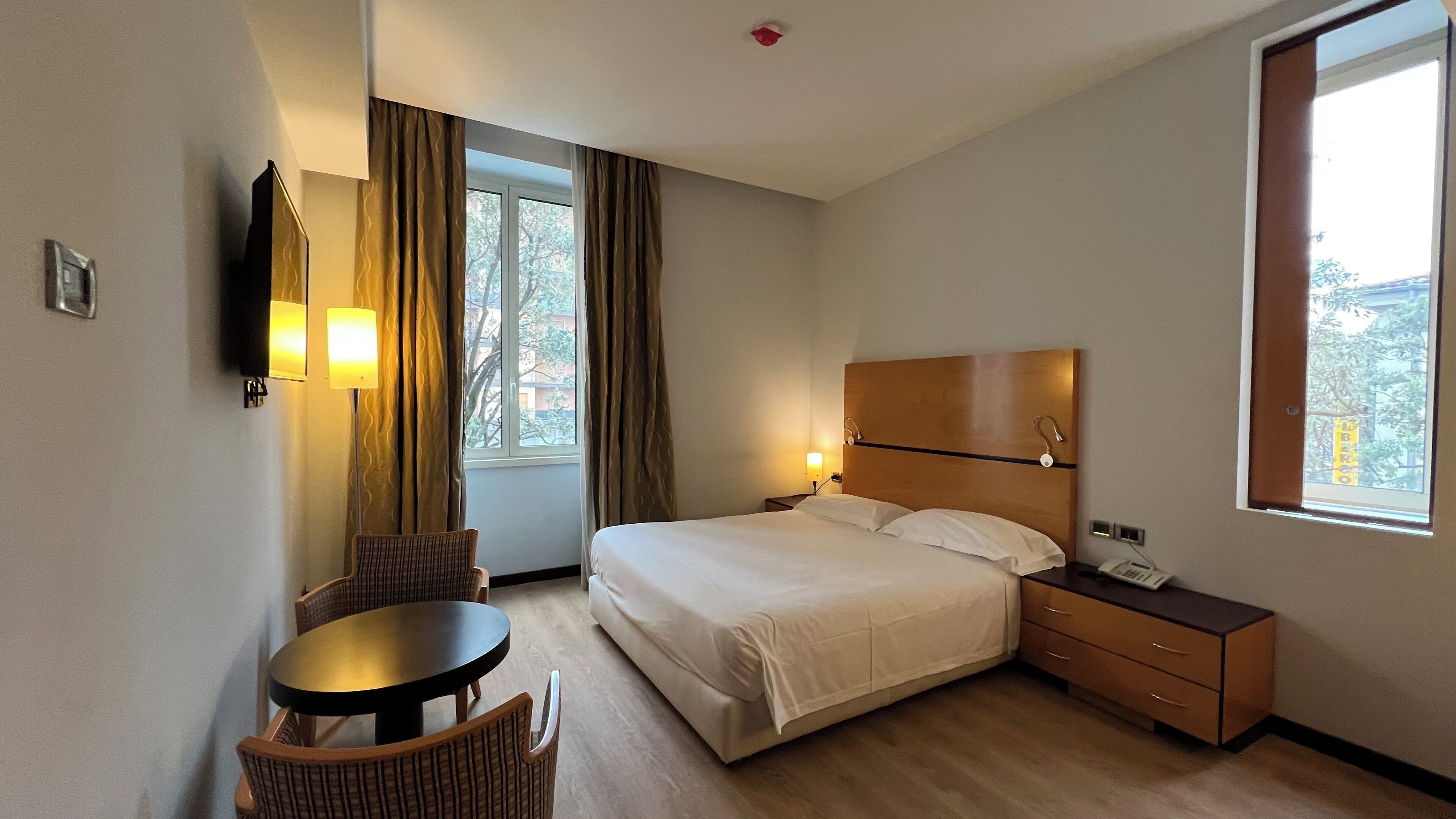 Superior Double Room | Minibar, in-room safe, desk, blackout drapes
