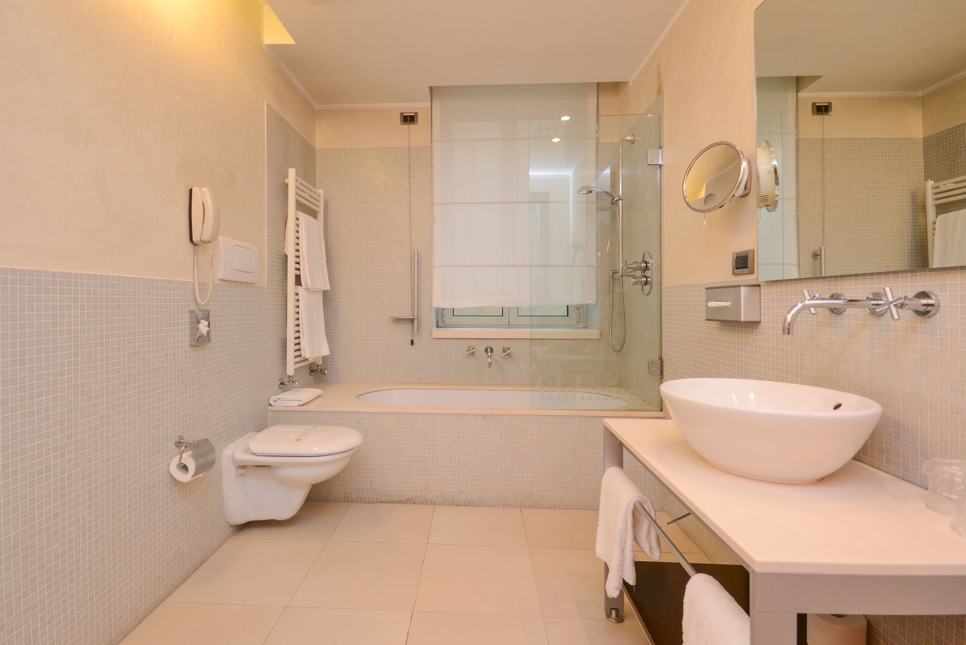 family room | bathroom | free toiletries, hair dryer, bidet, towels