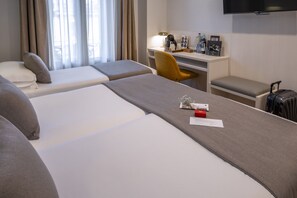 Comfort Triple Room, Private Bathroom | In-room safe, desk, blackout drapes, iron/ironing board