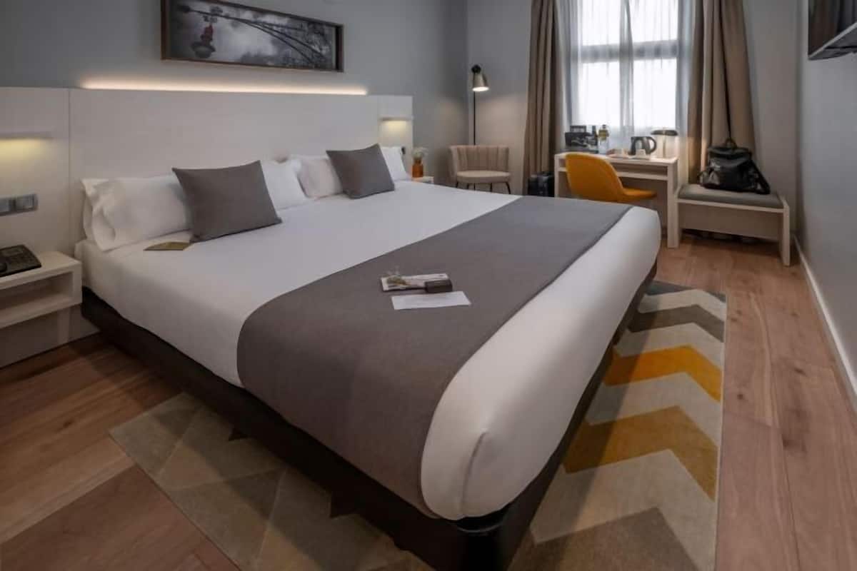 In-room safe, desk, blackout curtains, iron/ironing board (on request)