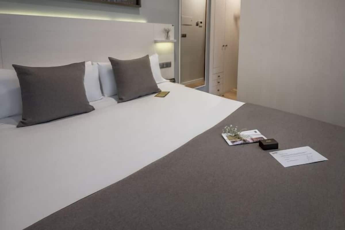 In-room safe, desk, blackout curtains, iron/ironing board (on request)