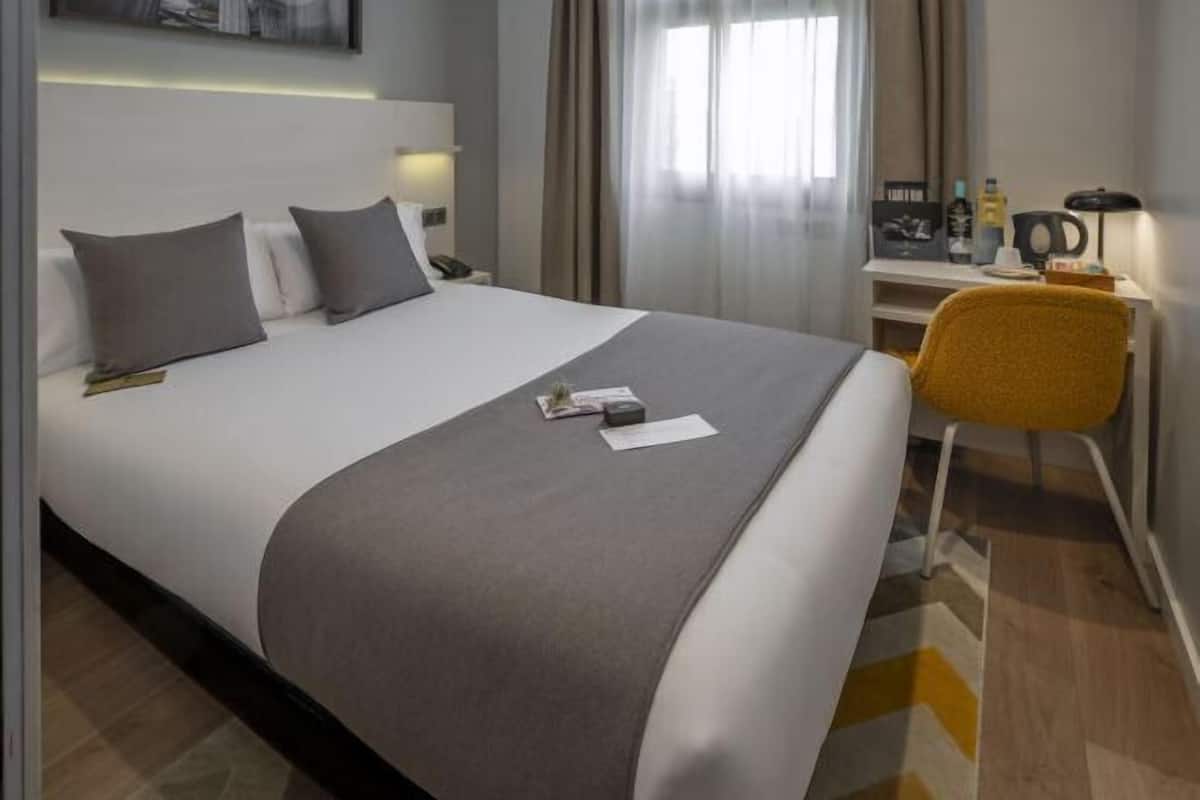 In-room safe, desk, blackout curtains, iron/ironing board (on request)