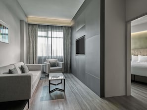Executive Suite, 1 King Bed | Minibar, in-room safe, individually furnished, desk