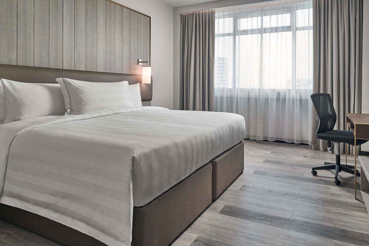 Superior Room with 1 King Bed | Minibar, in-room safe, individually furnished, desk
