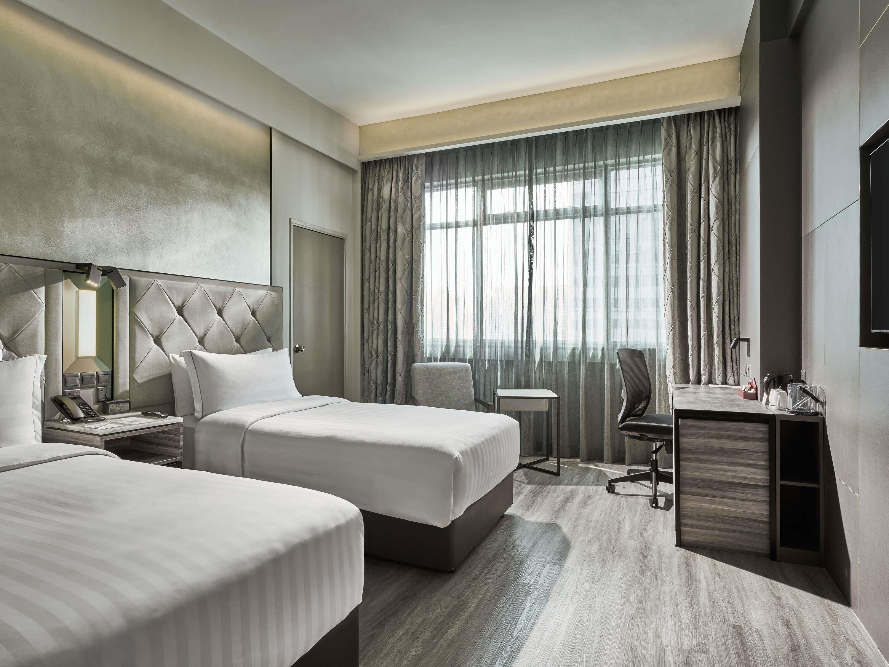 Deluxe Room with 2 Single Beds | Minibar, in-room safe, desk, blackout drapes