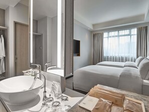 Family Room, Multiple Beds (Premier) | Minibar, in-room safe, desk, blackout drapes - Novotel Singapore on Kitchener (Singapore)