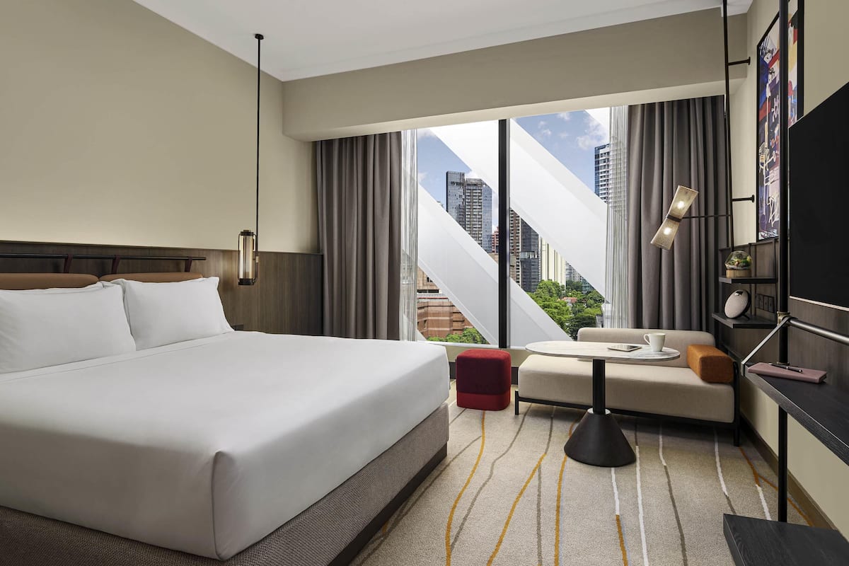 Premier Room, 1 King Bed (Orchard Paragon View) | In-room safe, desk, blackout drapes, iron/ironing board