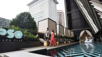 Outdoor pool, open 6:00 AM to 10:00 PM, free cabanas