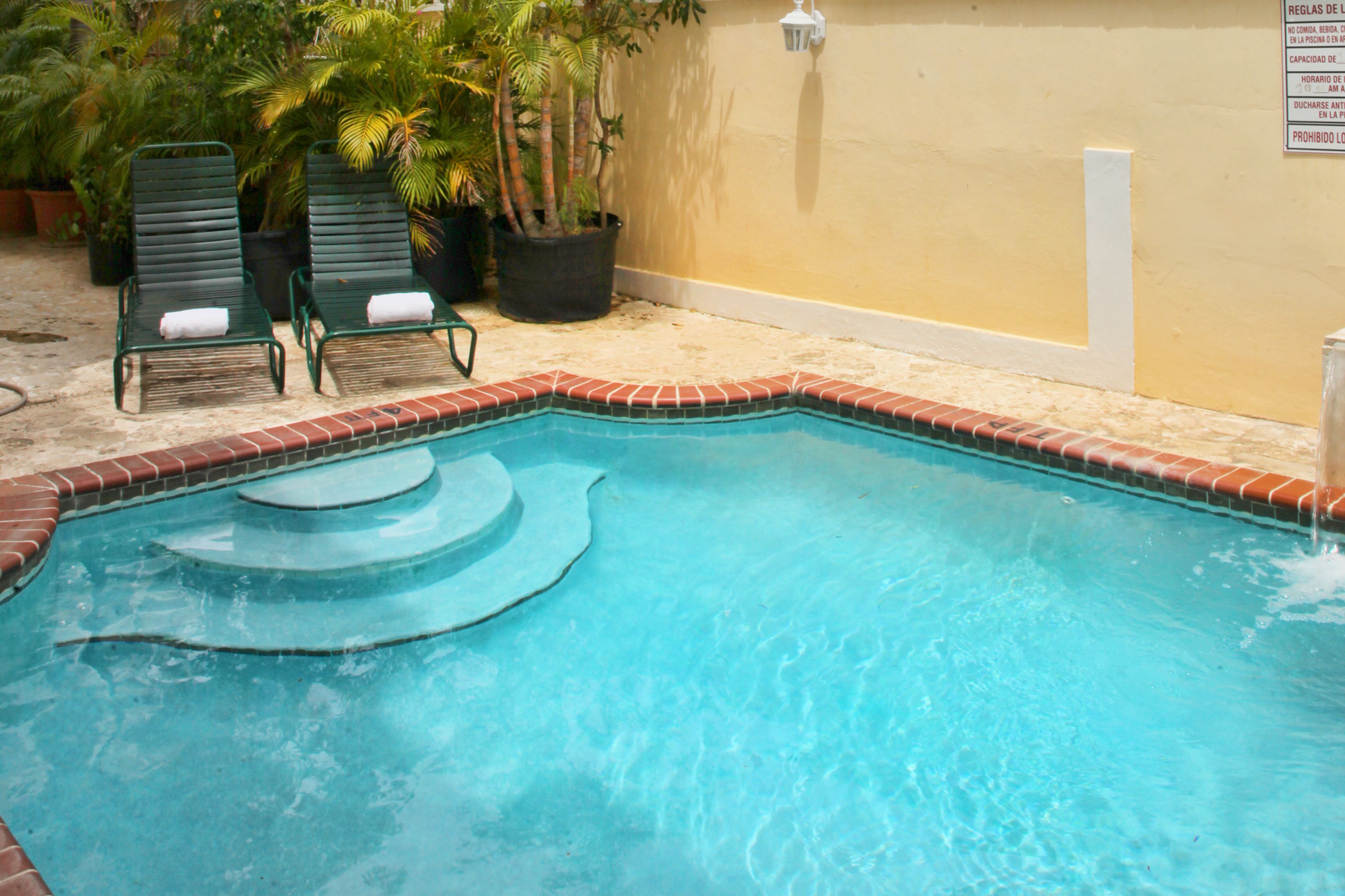 outdoor pool, pool loungers