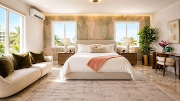 Ocean King Penthouse | Down comforters, individually decorated, individually furnished