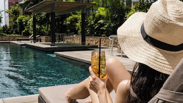 Outdoor pool, open 7:00 AM to 8:00 PM, free pool cabanas, pool umbrellas