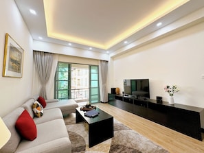 Family Room | Living area | 55-inch LCD TV with satellite channels, TV, fireplace