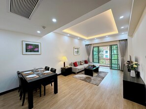Family Room | Living area | 55-inch LCD TV with satellite channels, TV, fireplace - Diamond Westlake Suites (Hanoi)