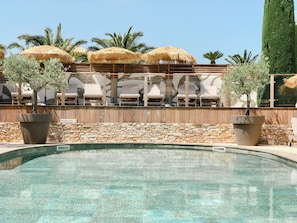 2 outdoor pools, pool umbrellas, pool loungers