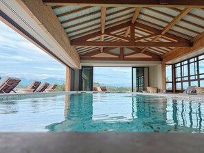 2 outdoor pools, pool umbrellas, pool loungers