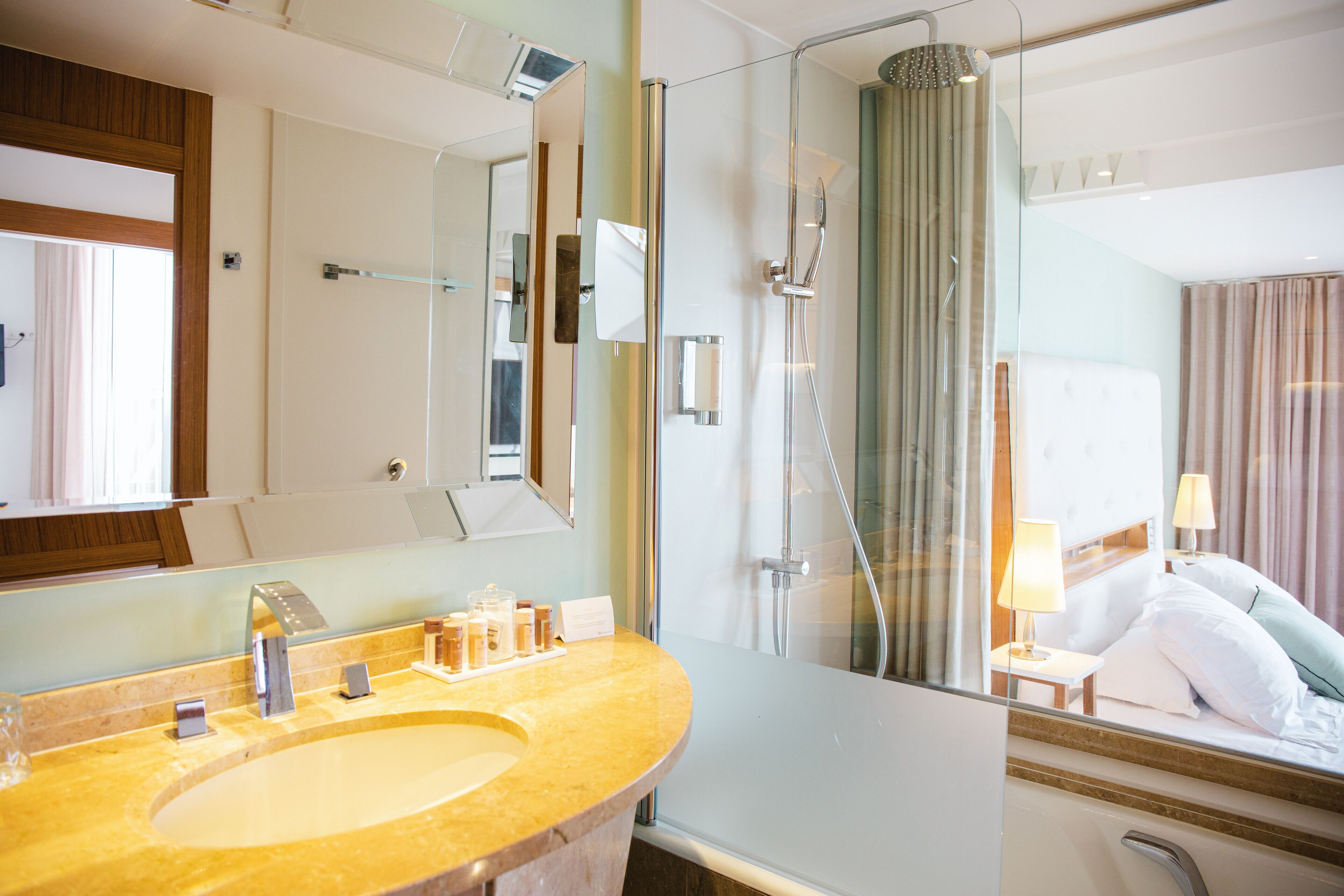 prestige suite | bathroom | designer toiletries, hair dryer, bathrobes, slippers