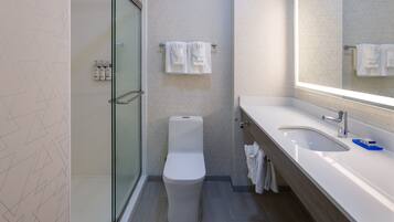 Combined shower/tub, hair dryer, towels, soap