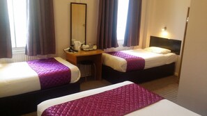 Quadruple Room | 1 bedroom, in-room safe, desk, iron/ironing board