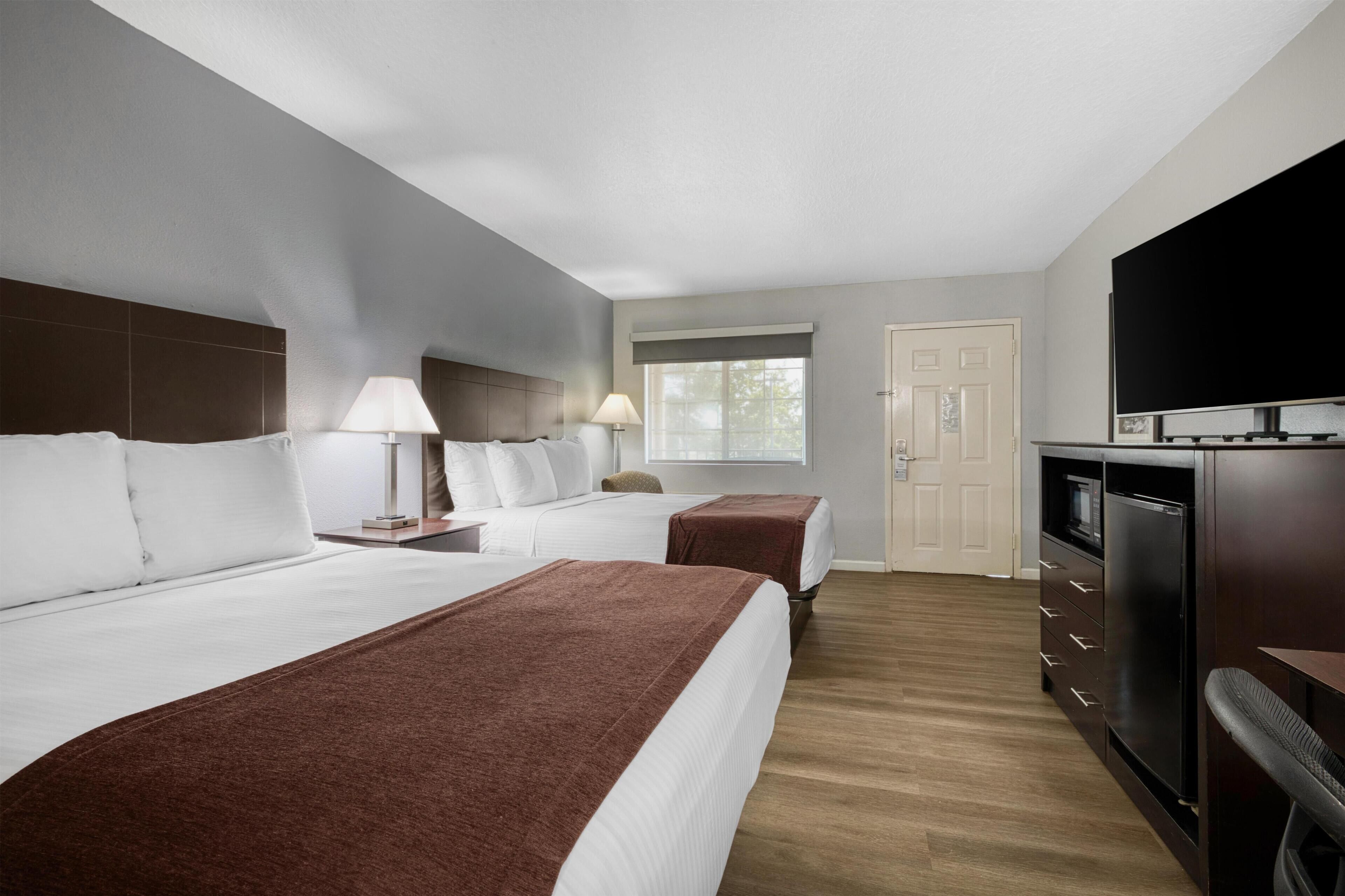 Standard Room, 2 Queen Beds, Non Smoking, Refrigerator &amp; Microwave | Individually furnished, desk, iron/ironing board, rollaway beds