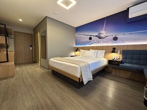 Quarto Casal Premier | Minibar, in-room safe, desk, blackout curtains - Hotel Panamby Guarulhos (Guarulhos)