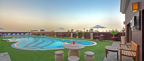 Outdoor pool, pool umbrellas, pool loungers