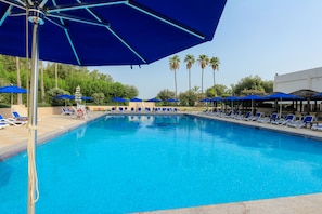 Outdoor pool, pool umbrellas, pool loungers