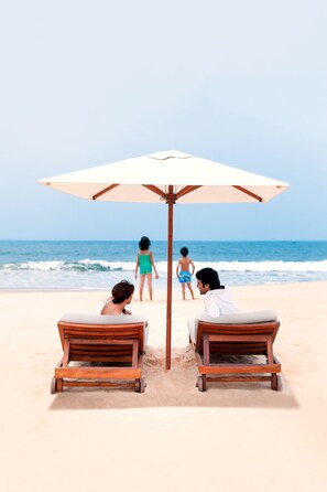 Beach cabanas, waterskiing