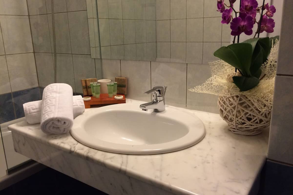 deep-soaking bathtub, free toiletries, hair dryer, bathrobes