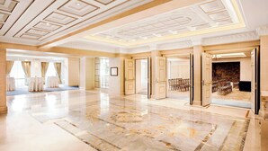A spacious lobby with a polished marble floor, elegant ceiling design, and a seating area with chairs. - King George, a Luxury Collection Hotel, Athens (Athens)