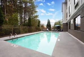 Outdoor pool, open 10:00 AM to 10:00 PM, sun loungers