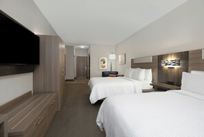 A hotel room with two beds, a TV, a desk, and a bathroom visible in the background. - Holiday Inn Express & Suites Acworth - Kennesaw Northwest by IHG (Acworth)