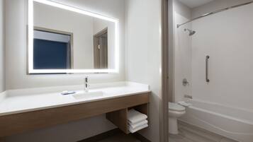 Suite, 1 King Bed with Sofa bed | Bathroom | Free toiletries, hair dryer, towels, soap