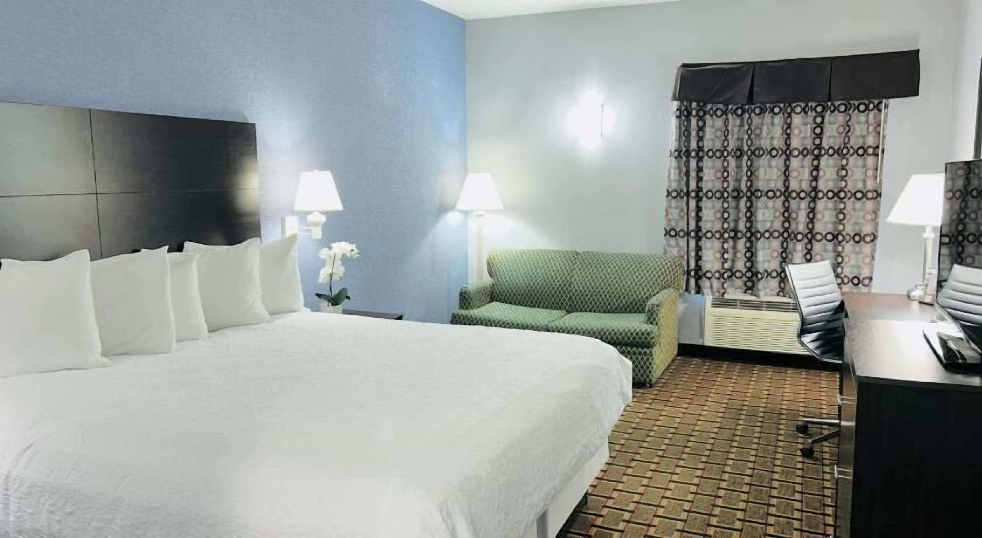 Premium bedding, down comforters, pillowtop beds, desk