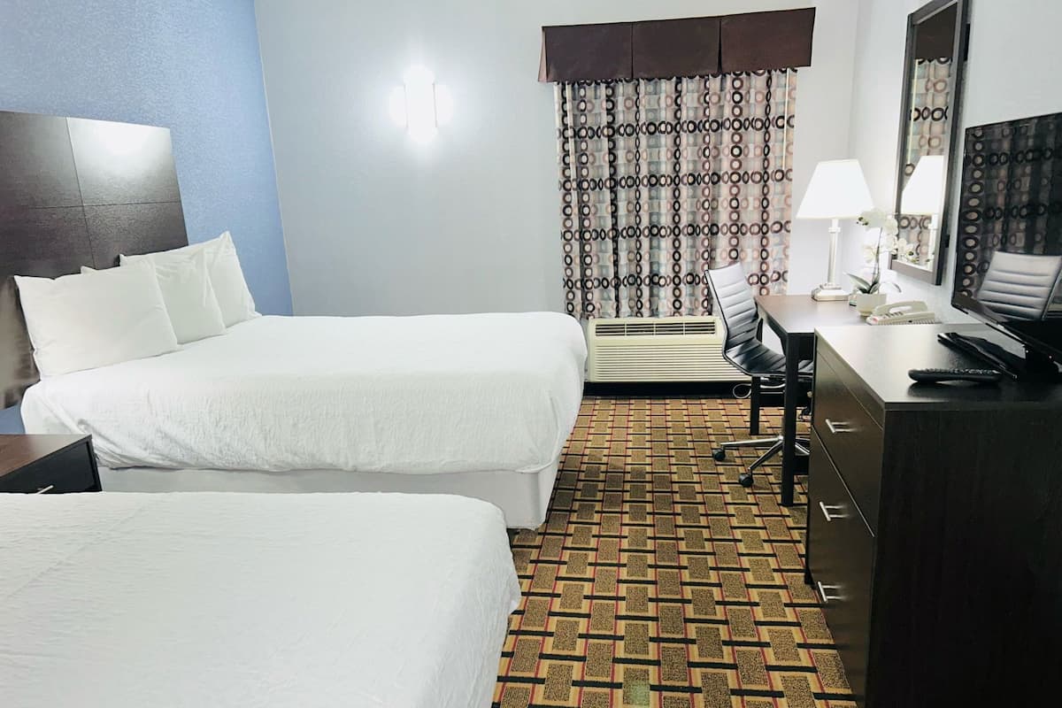 Premium bedding, down comforters, pillowtop beds, desk