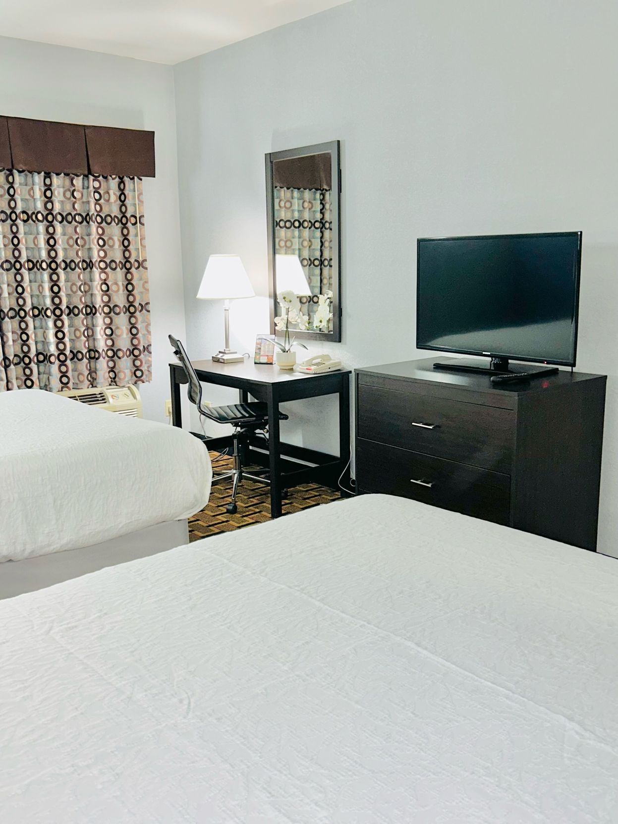 Premium bedding, down comforters, pillowtop beds, desk