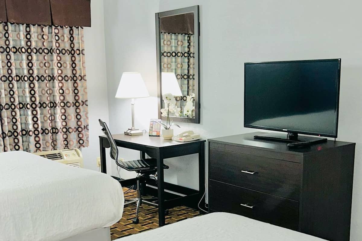 Premium bedding, down comforters, pillowtop beds, desk