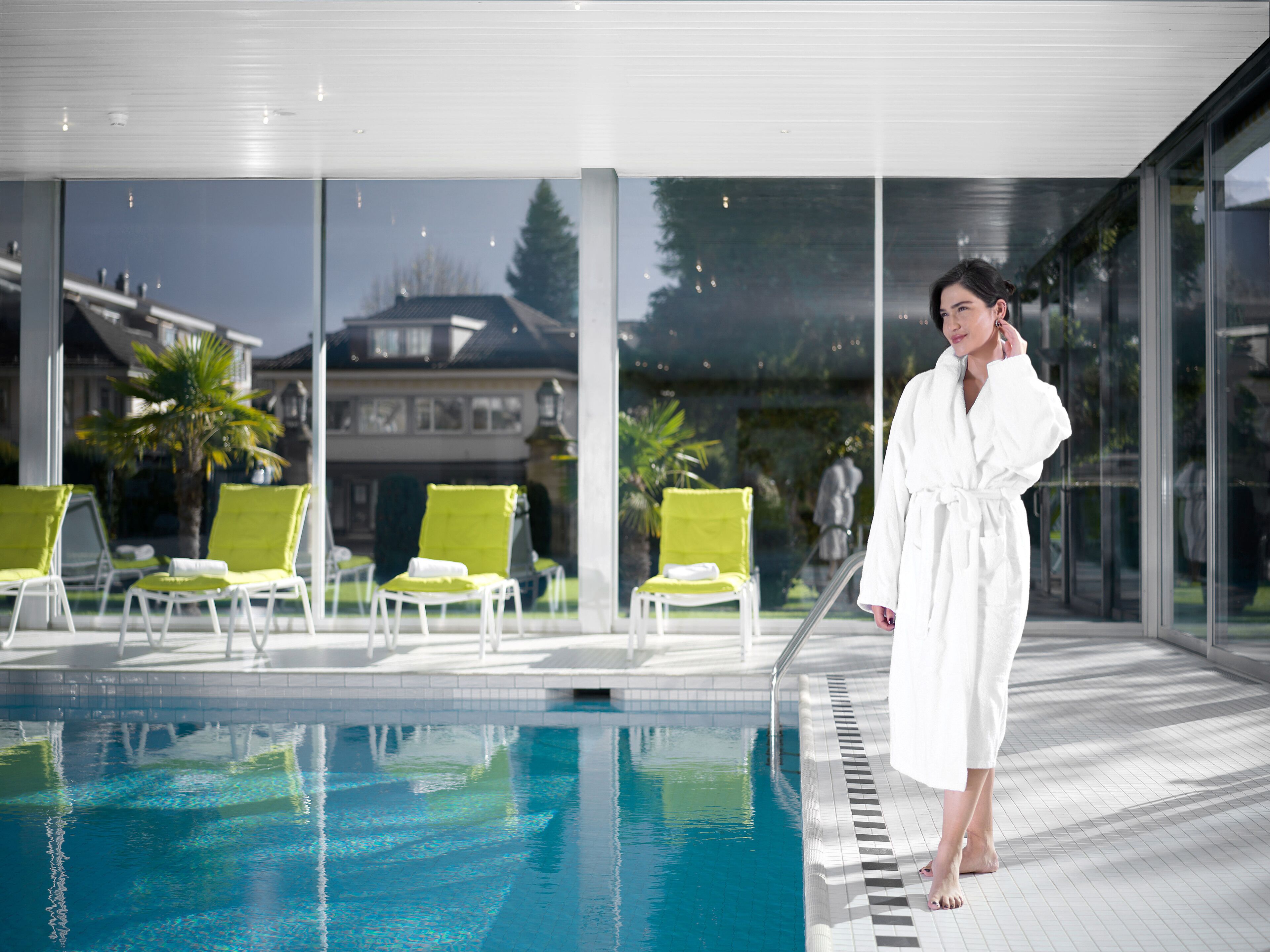 Indoor pool, open 7:30 AM to 9:00 PM, pool loungers