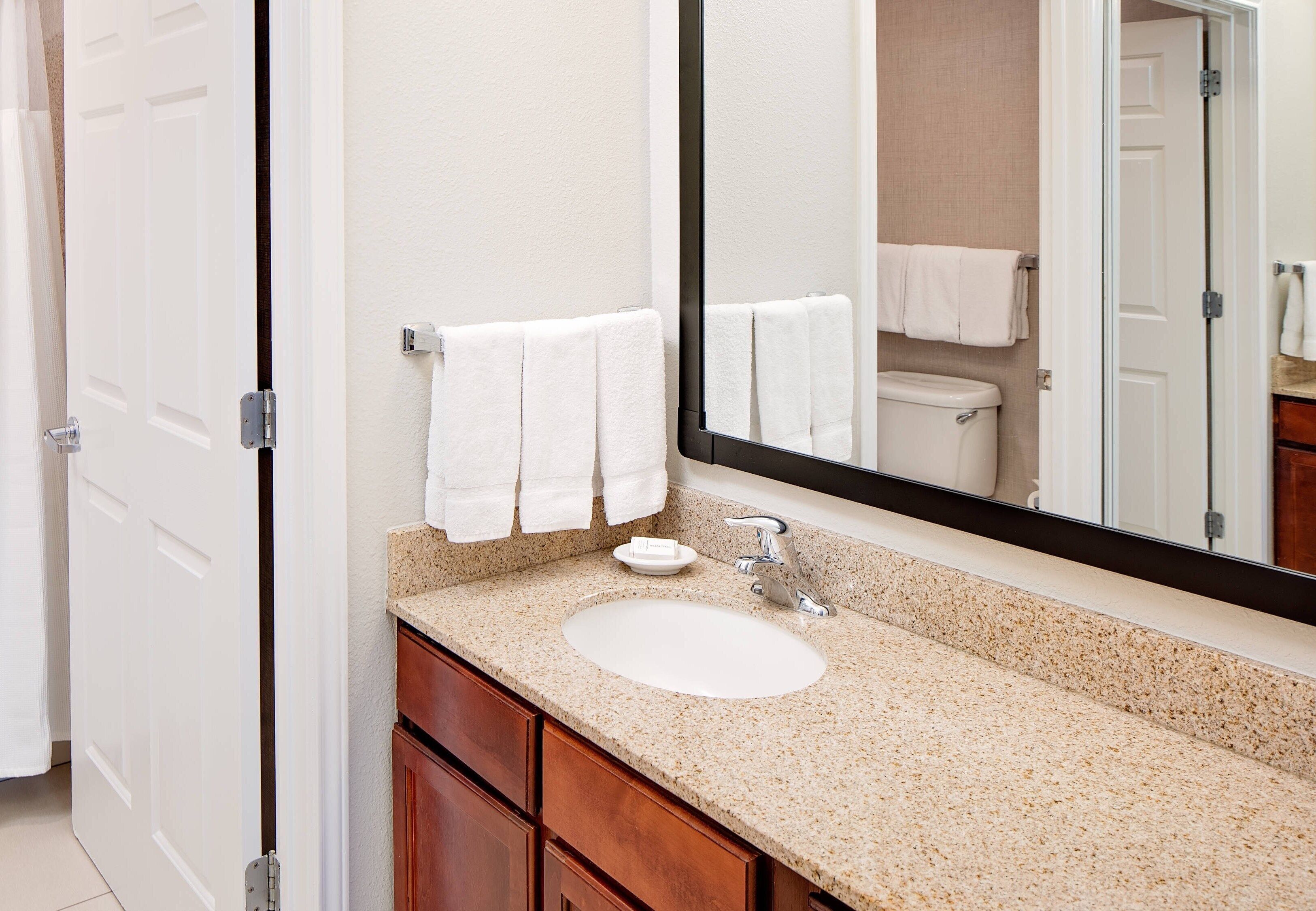 combined shower/bathtub, free toiletries, hair dryer, slippers