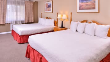 Deluxe Double Room, Ground Floor | Desk, blackout drapes, iron/ironing board, free WiFi