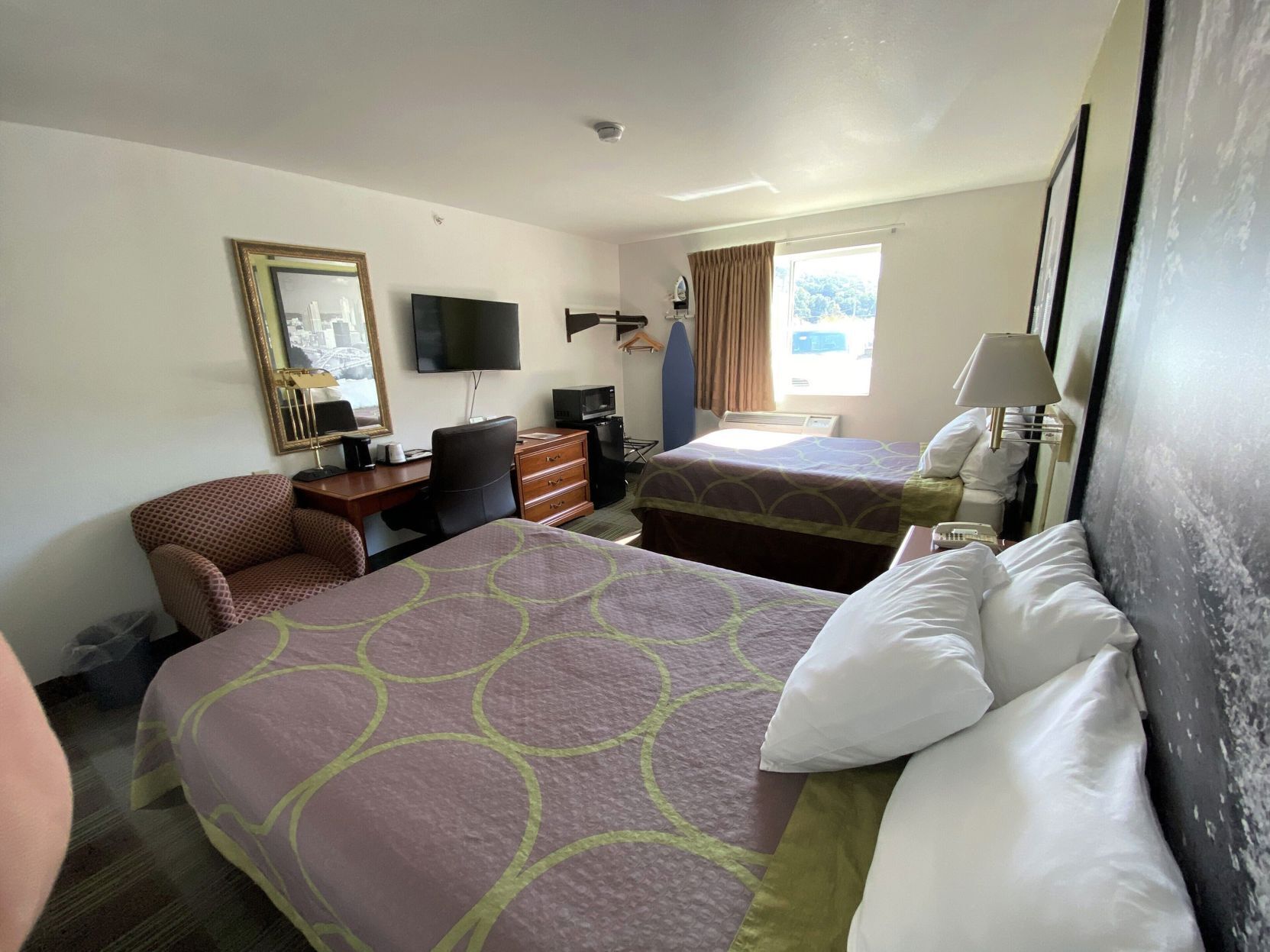 Desk, iron/ironing board, free cribs/infant beds, rollaway beds