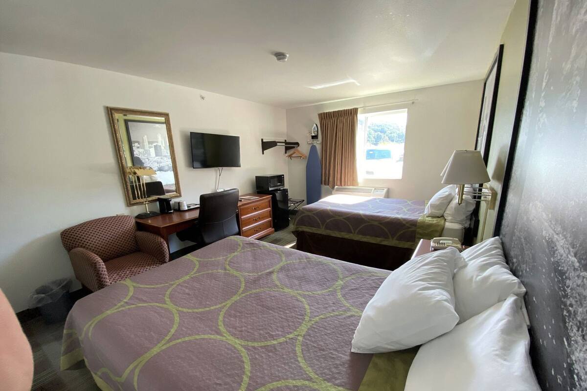 Desk, iron/ironing board, free cribs/infant beds, rollaway beds