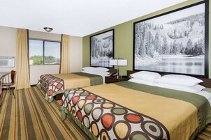 Desk, laptop workspace, iron/ironing board, free cribs/infant beds