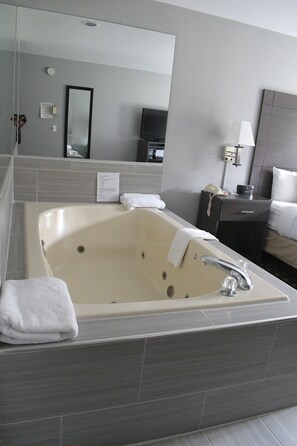 Suite, 1 King Bed, Jetted Tub | Private spa tub